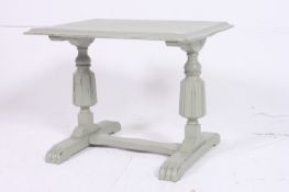 A retro 1950's painted green shabby chic coffee table raised on bulbous legs with splayed feet.