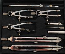 A cased vintage mathematical set by Wedeco to include compasses and other instruments. In original