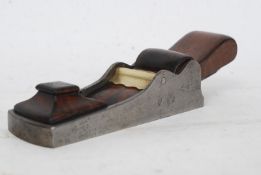 A vintage Gunmetal and steel rosewood infill chariot plane