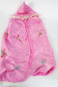 A mid 20th century Chinese oriental silk and embroidered childs cape / coat, with elaborate stylised