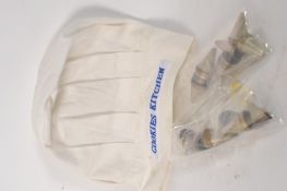 Cotton chefs hat together with a quantity of vintage icing nozzles