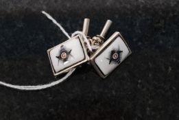 A pair of white metal 925 silver and enamel set masonic cufflinks.  Weight 11.4 grams