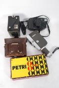 A collection of vintage cameras to include a leather cased Ilford and other examples