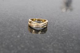 An 18ct gold and diamond ladies ring having channel set diamonds approx 0.33cts.  Weight 3.7