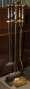 A modern fireside companion set comprising stand, tongs and brush. Measures:82x22.