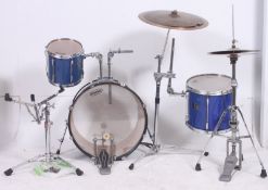 A Pearl Drum kit comprising Bass drum, symbals, tripods etc