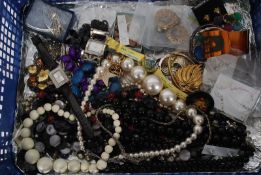 A collection of costume jewellery to include watches, bracelets, necklaces, brooches, earrings etc