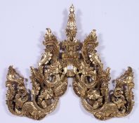 A large wood gilt laquered Chinese carving with gilt facia and red painted verso.  H80cm x W86cm x