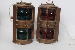 A pair of mid 20th century masthead port / starboard ships lamps in copper with glass lenses.