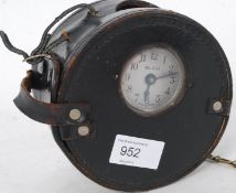 A 20th century Industrial leather cased Blick nightwatchmans recording clock
