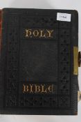 A 19th century ( James  ) Holy Bible being leather embossed and brass clasps to sides ( binding af )