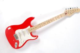 A Ray Pierre Protone 3000 Electric guitar in red and white
