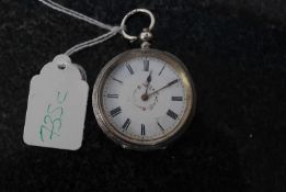 A 935 silver early 20th century rococo ladies pocket watch. The central face with roman numerals