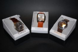 A  collection of 3 Timex watches being n