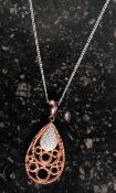 A silver gilt and CZ pendant necklace