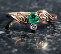 18ct yellow gold emerald and diamond rin