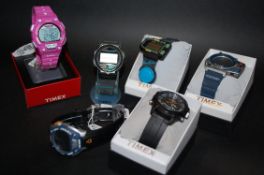 A collection of Timex watches being new