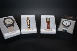 A collection of Timex watches being new