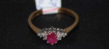 9ct gold ruby and diamond boat shape clu