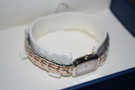 A ladies 2 tone stainless steel and copp