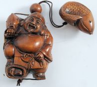 A Chinese carved inro hardwood figure of