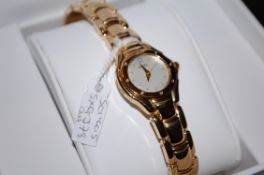 A ladies Seiko gold plated and diamond w