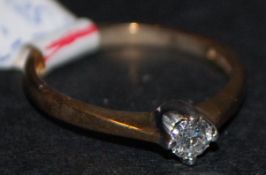 9ct gold diamond solitaire ring .15ct Si