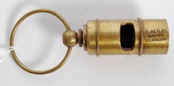 A brass and wood Titanic whistle