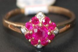9ct gold 13 stone diamond and ruby ring