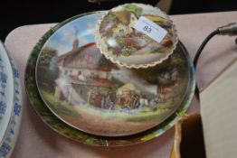 Two German plates depicting country scenes and one other