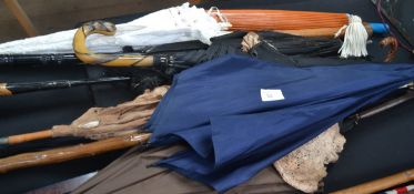 A collection of vintage parasols and umbrellas