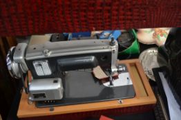 A Brother sowing machine with key