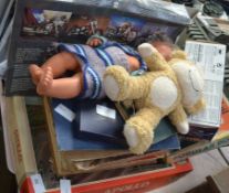 An assortment of childrens toys , books and puzzles