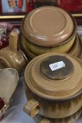 A brown china dinner set