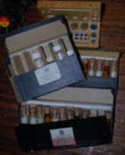 Nelson and Co Ltd medicine vials along with a calligraphy set