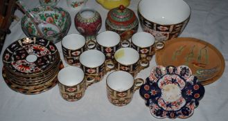 Small Oriental cups and saucers with others