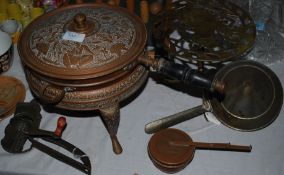 A selection of brass cooking equipment