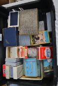 Assorted vintage playing cards in boxes