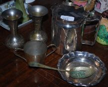 A selection of metal wares to include jugs and vases