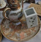 An assortment of oriental wares to include a plate depicting three warriors