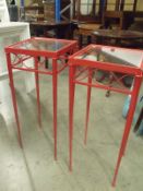 Pair of high red steel display  tables with clear glass top