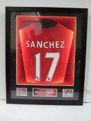 Signed football shirt 'Sanchez'. Supplied in a frame and with certificate of authenticity. Size in