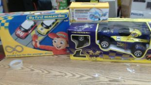 Toy selection as pictured - large Radio control racer / scalextrix - boxed in original packaging -