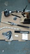 Boxed Titan Petrol driven mptor multi gardening tool with all atatchments as pictured - boxed in