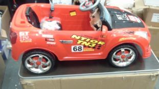 Ride on Super  car style  in red with battery & remote & charger - Ex Showroom -untested  looks