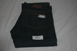 RAKE - jeans colou indigo size 30 retail Â£245