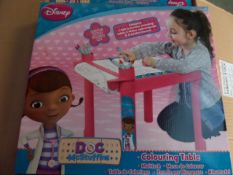 8 x Disney Doc McStuffins colouring tables. Each set includes: 1 x 5m colouring roll, 1 x self