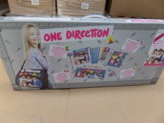 12 x One Direction (1D) large tour case gift set. Each set includes: 1 x A6 Spiral notebook, 15cm