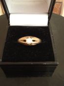 9ct gold ring with a single diamond