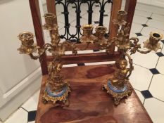 A pair of antique cherubs